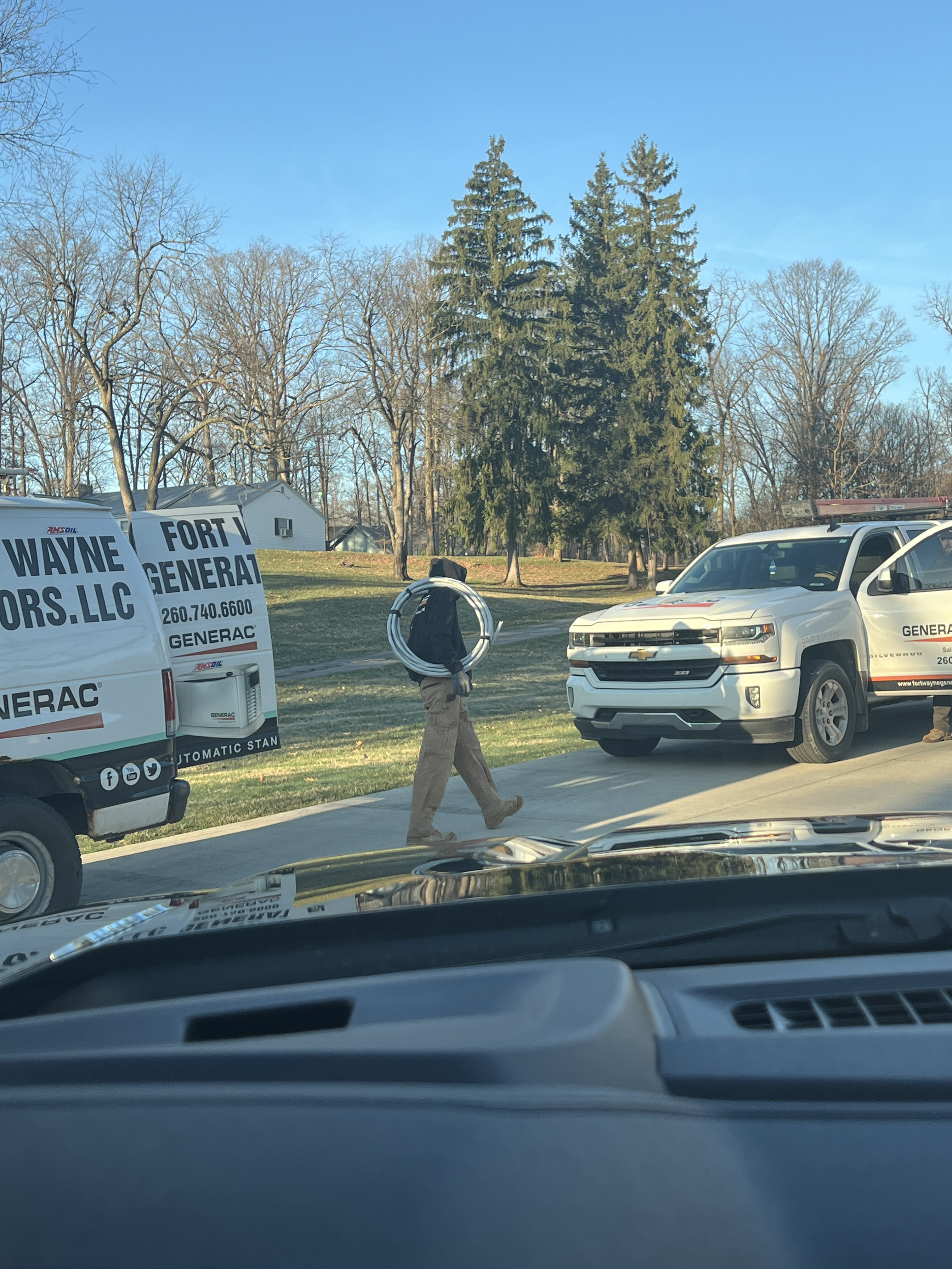chilly spring day install - preparing the customer for storm season